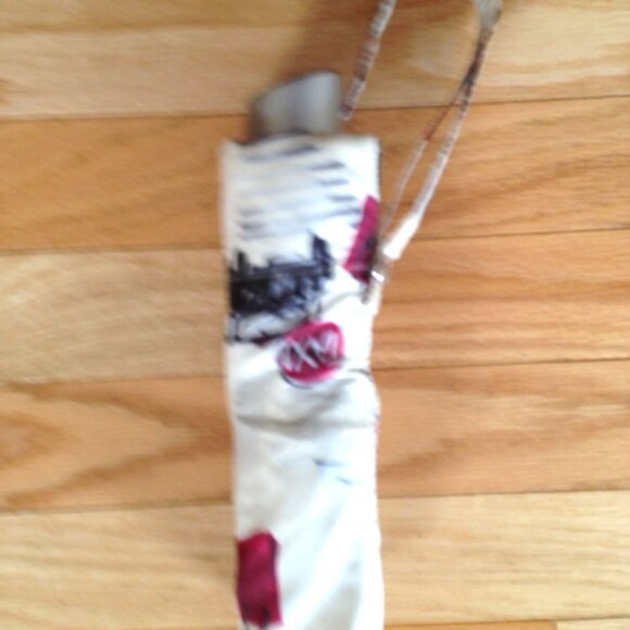 Burberry, and Moschino Umbrellas - Picture 11 of 16